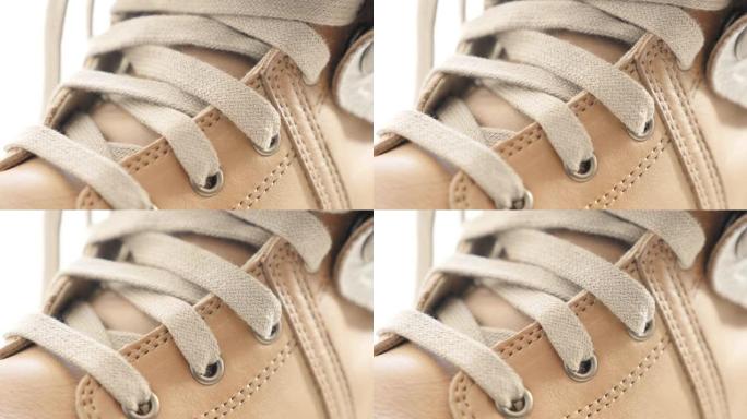女式皮靴细节和针脚特写倾斜4K