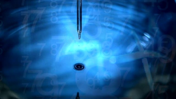 从针头滴入水中的液体特写动画在蓝色背景上产生涟漪