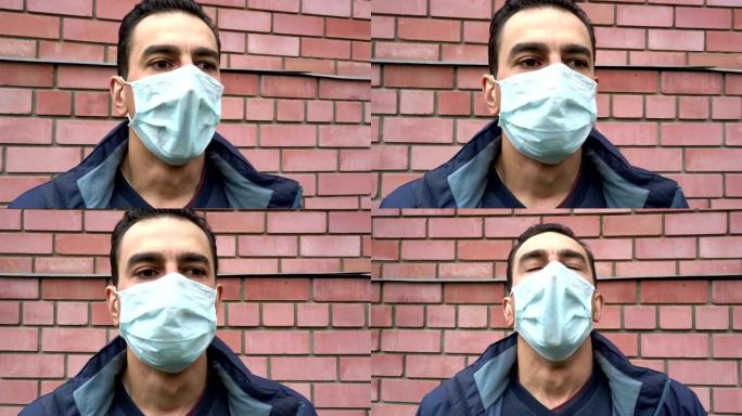 男子戴着医用口罩，气喘吁吁，窒息，生病，沉重的咳嗽，气喘吁吁，受苦。肖像