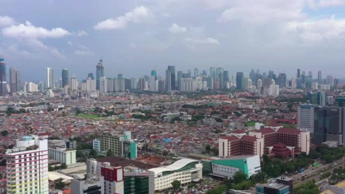 雅加达城市景观晴天中心区交通街空中全景4k印度尼西亚