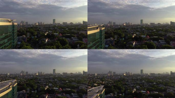 日落太阳灯雅加达市中心豪华私人住宅区航空全景4k印度尼西亚