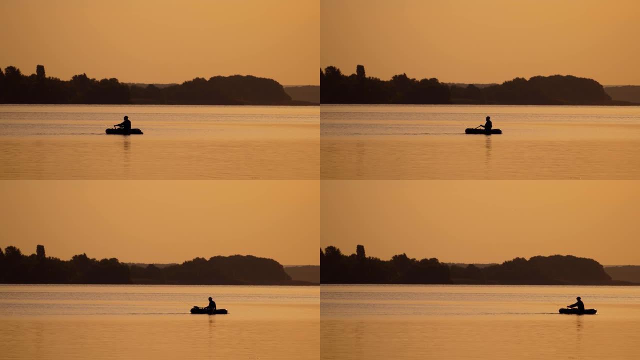 渔夫在日落时乘船