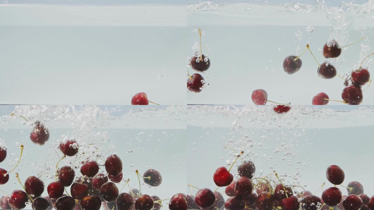 成熟的甜樱桃在干净的白色背景上溅入水中。水中的气泡。慢动作。水下视频拍摄。全高清视频，240fps，