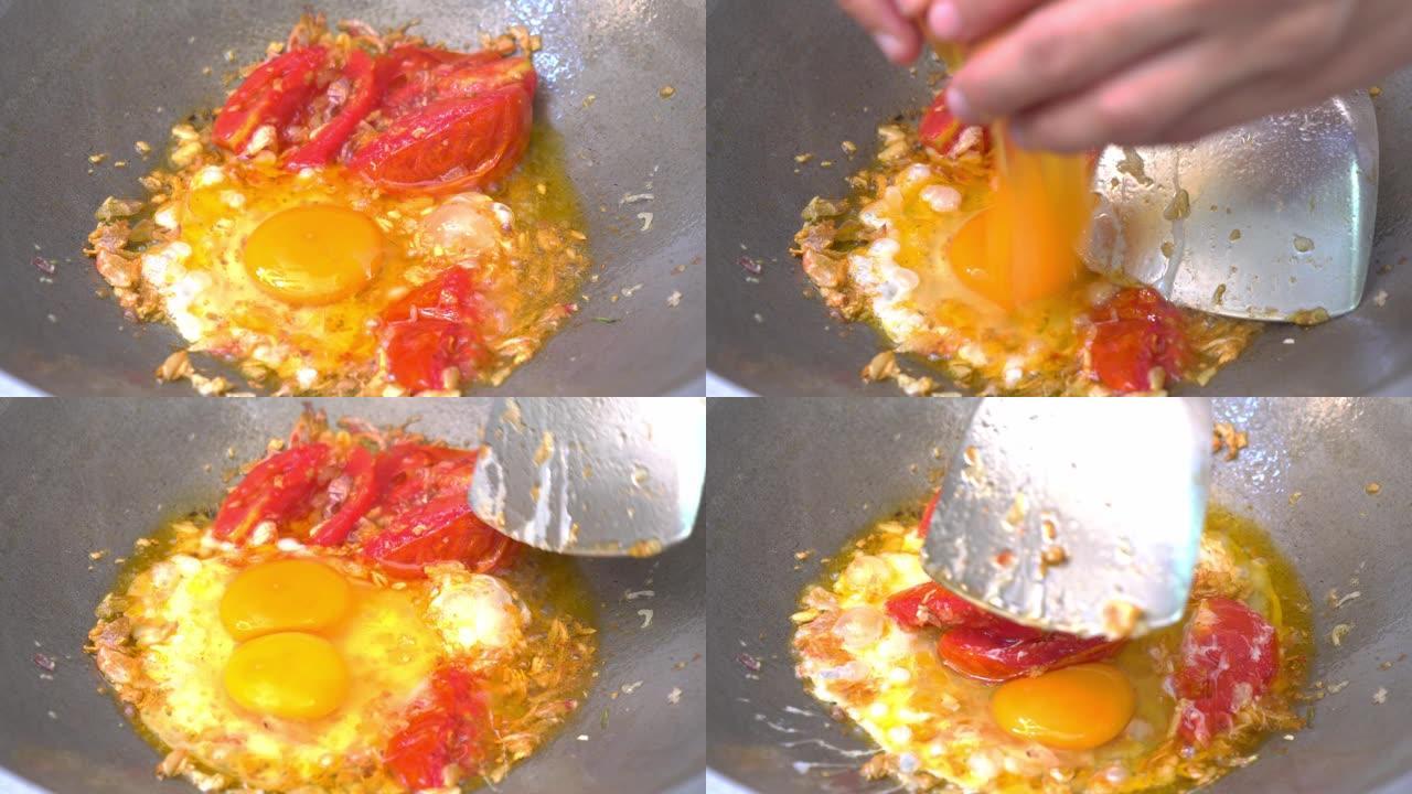 鸡蛋番茄锅在热油锅上油炸。