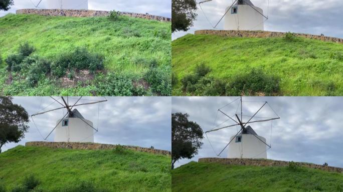 葡萄牙阿尔加维镇Odeceixe附近的传统葡萄牙风车。向上平移