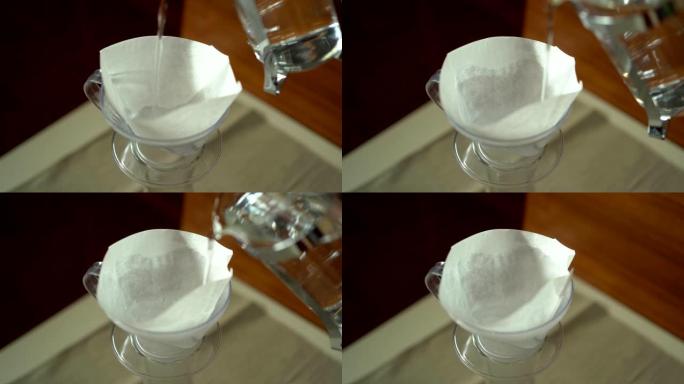用热水冲洗滴水咖啡滤纸