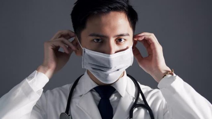 亚洲年轻医生戴医用口罩
