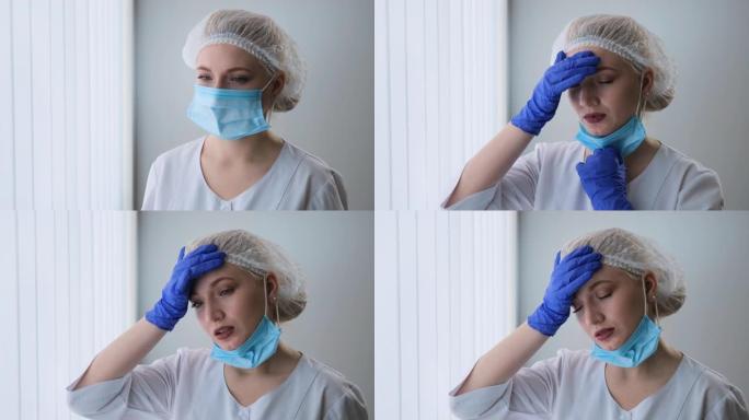 画像中的女白种医生身穿白色制服，戴着防护面罩和帽子，心情低落，精疲力竭，灰心丧气，很累后在医院接收病