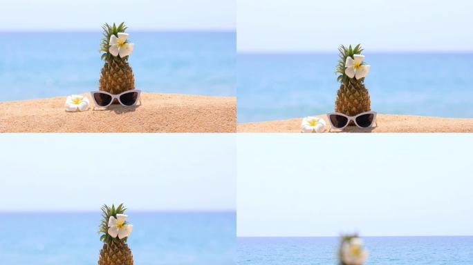 热带海滩上的新鲜菠萝和太阳镜。