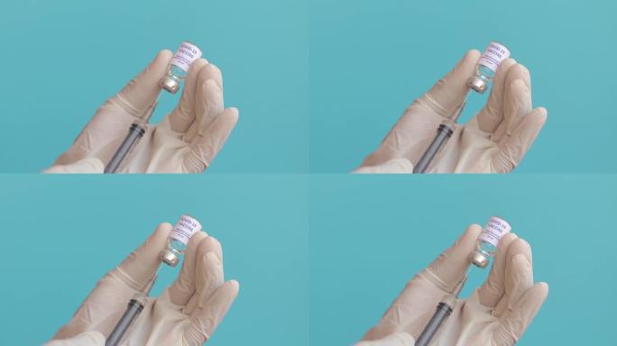 医生使用注射器从瓶中获得新型冠状病毒肺炎或冠状病毒疫苗-新型冠状病毒肺炎疫苗的概念，研究，世界各地的