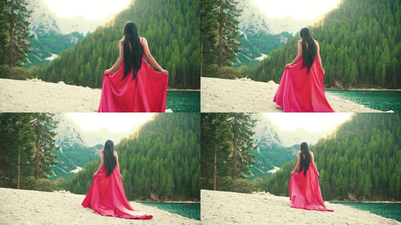 老电影带着纹路，神秘女子长着黑黑的长发，穿着红色的长丝绸休闲装太阳裙，走在山顶野生动物景观河上。他回