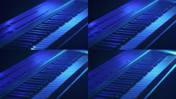 钢琴电子键盘特写，蓝光。