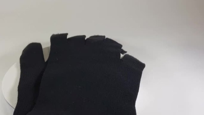 黑色薄手套，特写视频剪辑