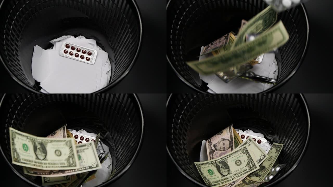 药丸和美元钞票扔进废纸篓的慢动作视频