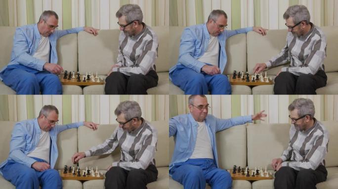 高级退休人员在家里和同伴玩象棋。