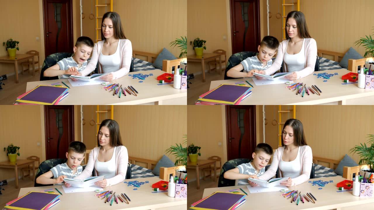 家庭教育。母子俩做美术用品作业