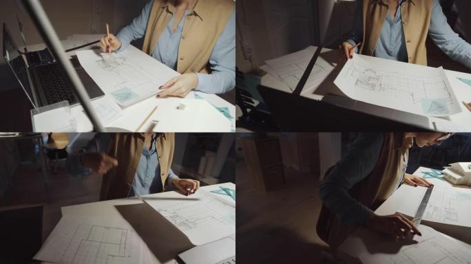 女建筑师在办公桌上纸上绘制施工计划