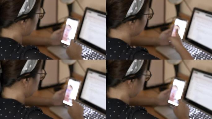 亚洲妇女的场景在家里有视频会议，在家工作，封锁，新型冠状病毒肺炎或冠状病毒