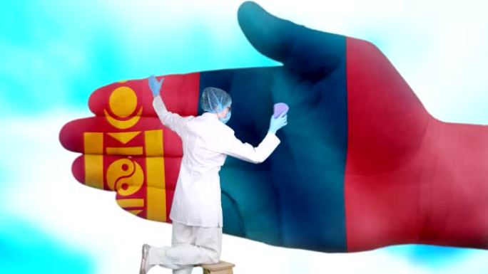 护士戴着医用口罩和手套洗大手，涂上蒙古国旗的颜色。国家对国民健康的关心。洗手的概念。病毒保护。疾病的