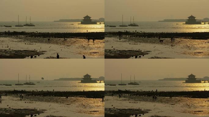 日落时间青岛市海滩湾码头延时全景4k中国