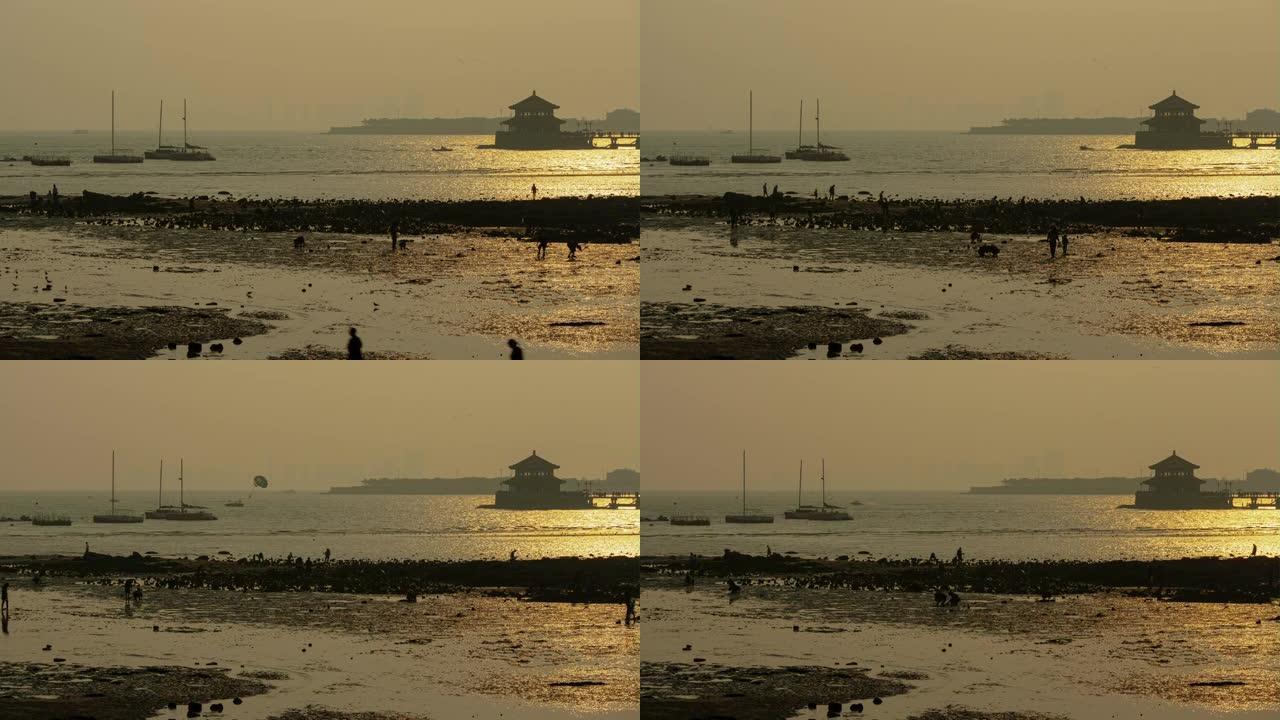 日落时间青岛市海滩湾码头延时全景4k中国