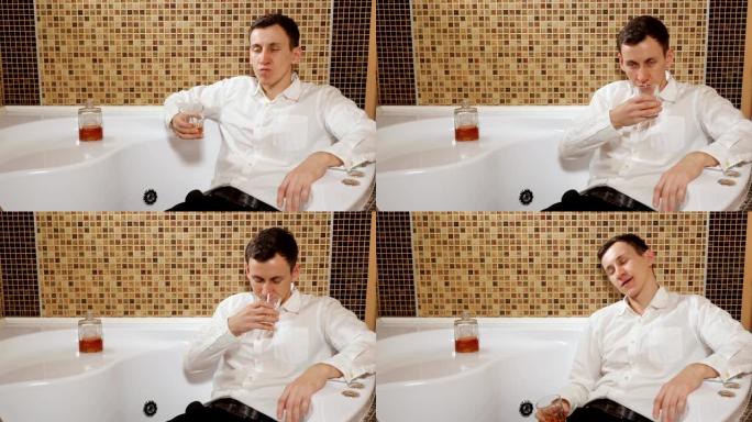 穿着裤子和衬衫的醉酒男子躺在浴缸里喝酒