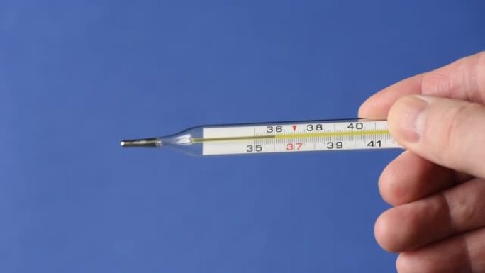 玻璃水银温度计在其尺度上显示人体的正常温度。
