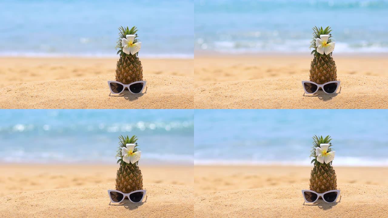 热带海滩上的新鲜菠萝和太阳镜。