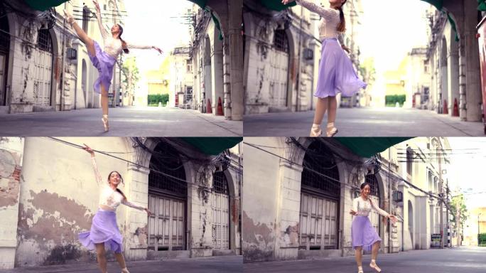 年轻美丽的芭蕾舞演员在街上跳舞