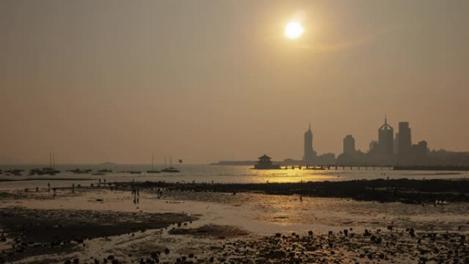 日落时间青岛市著名海滩地段潮汐延时全景4k中国