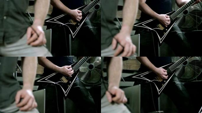 音乐乐队。一群音乐家在舞台上演奏摇滚乐。慢动作。高清