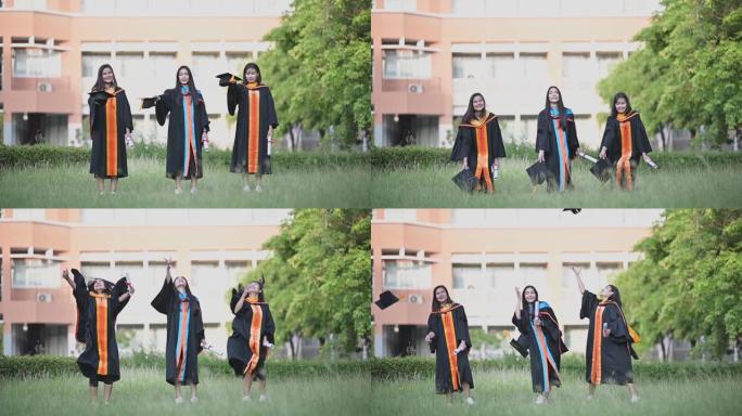 一位从大学毕业的亚洲女毕业生微笑着祝贺她毕业于大学。