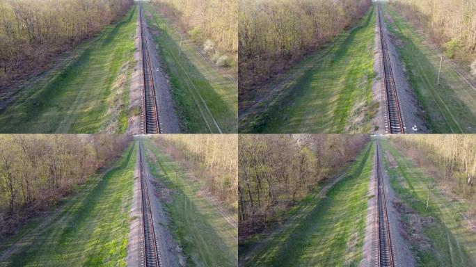 春天草地绿的时候，飞越铁路和轨枕。乘火车旅行。