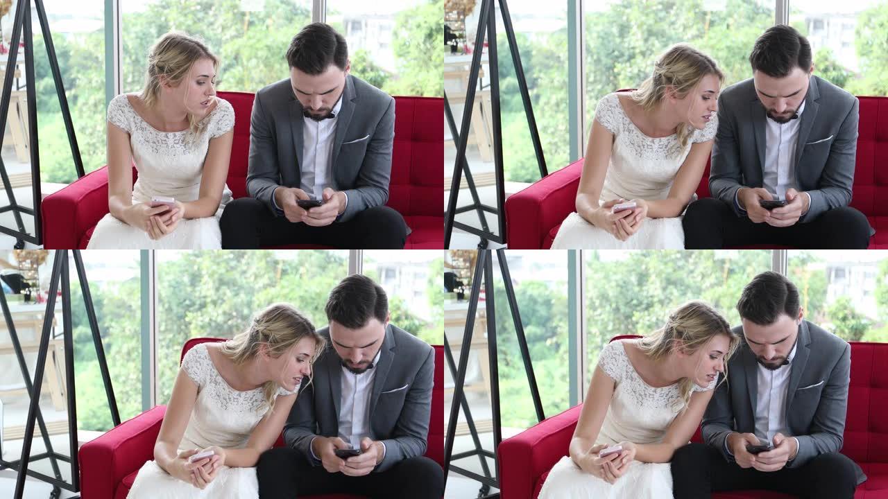 商务男人和商务女人正在使用移动和触摸智能手机