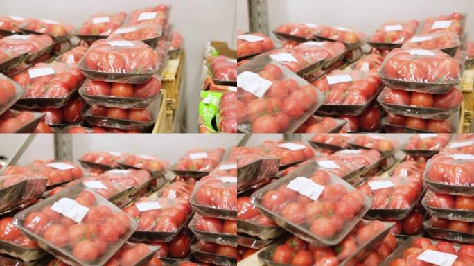 超市或蔬菜食品市场食品过道上的4k红色西红柿包装
