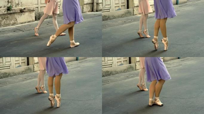 鞋子芭蕾舞女演员在街上跳舞的特写镜头