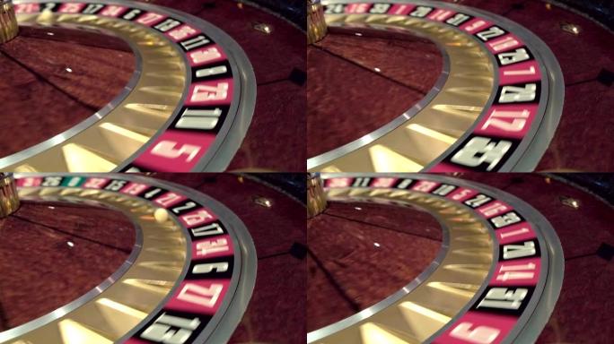 轮盘赌轮在赌场旋转轮盘赌的特写镜头，球进入绿色或红色或黑色数字