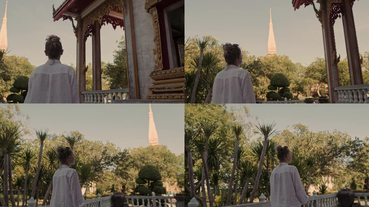 美女走在查龙寺的佛寺附近。观光。