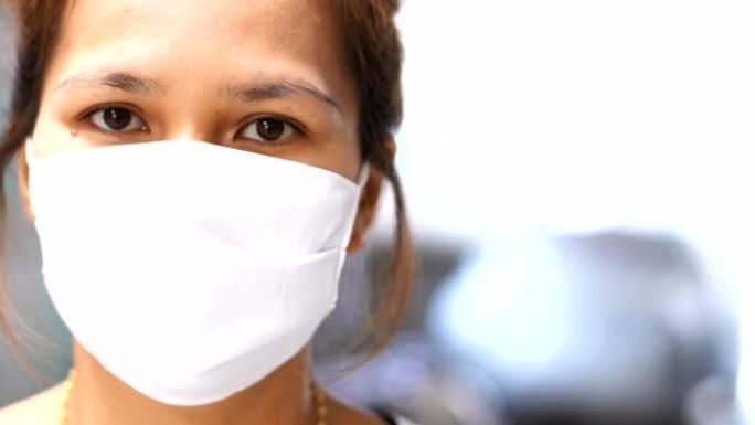 戴口罩的女性防病毒新型冠状病毒肺炎