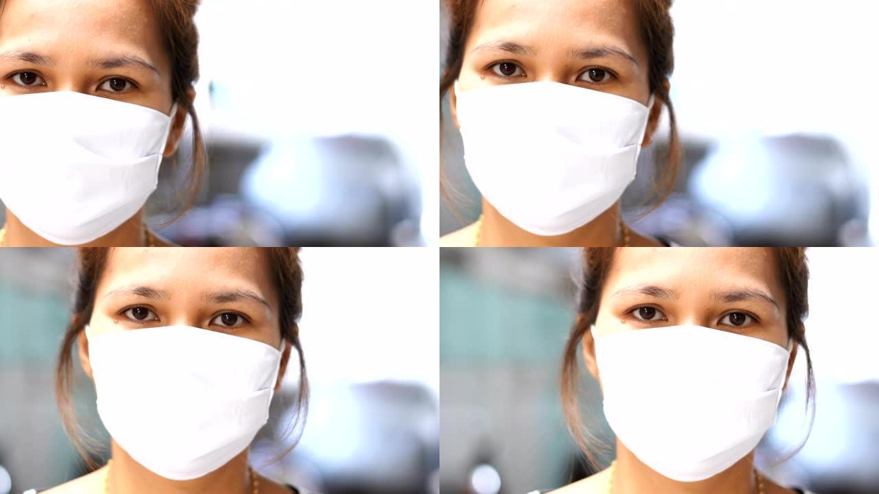 戴口罩的女性防病毒新型冠状病毒肺炎