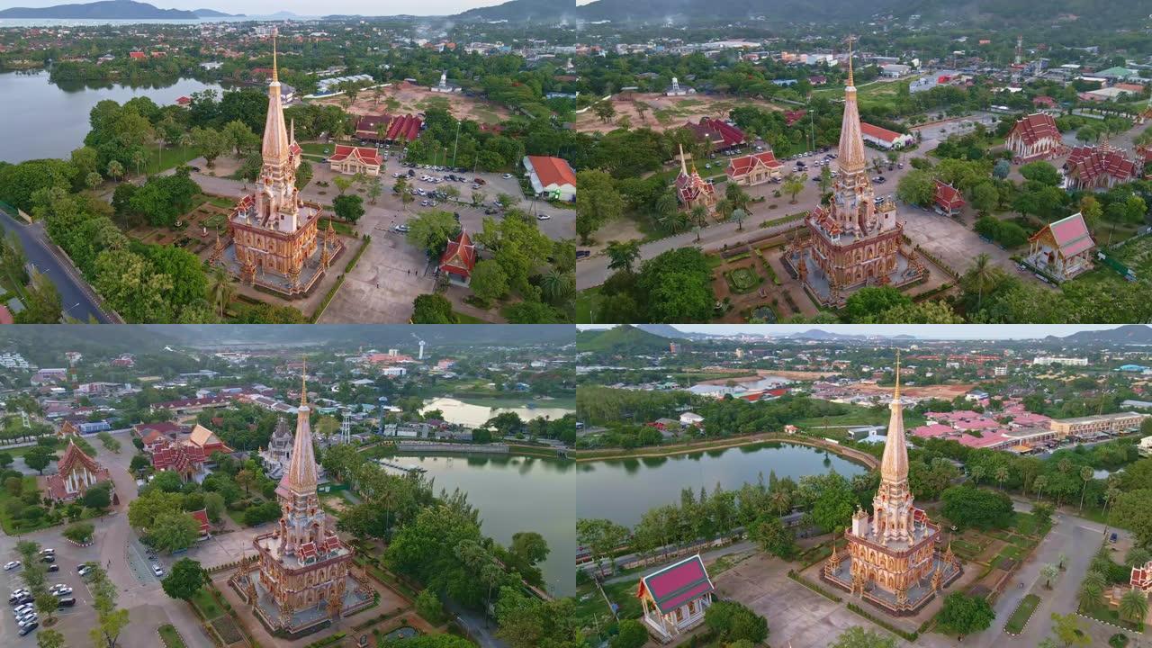 从泰国普吉岛查隆寺周围移动的4k UHD无人机视图。泰国普吉岛查龙寺是世界各地每个人的热门旅游目的地