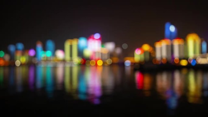 青岛市著名夜间照明市中心海湾模糊显示全景延时4k中国