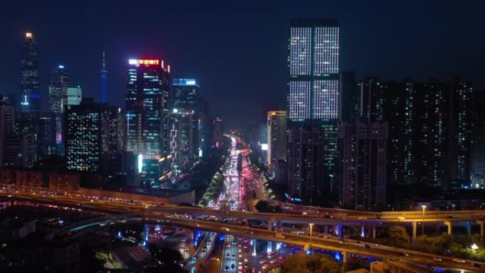 广州市中心夜间照明繁忙交通街路口空中全景4k中国