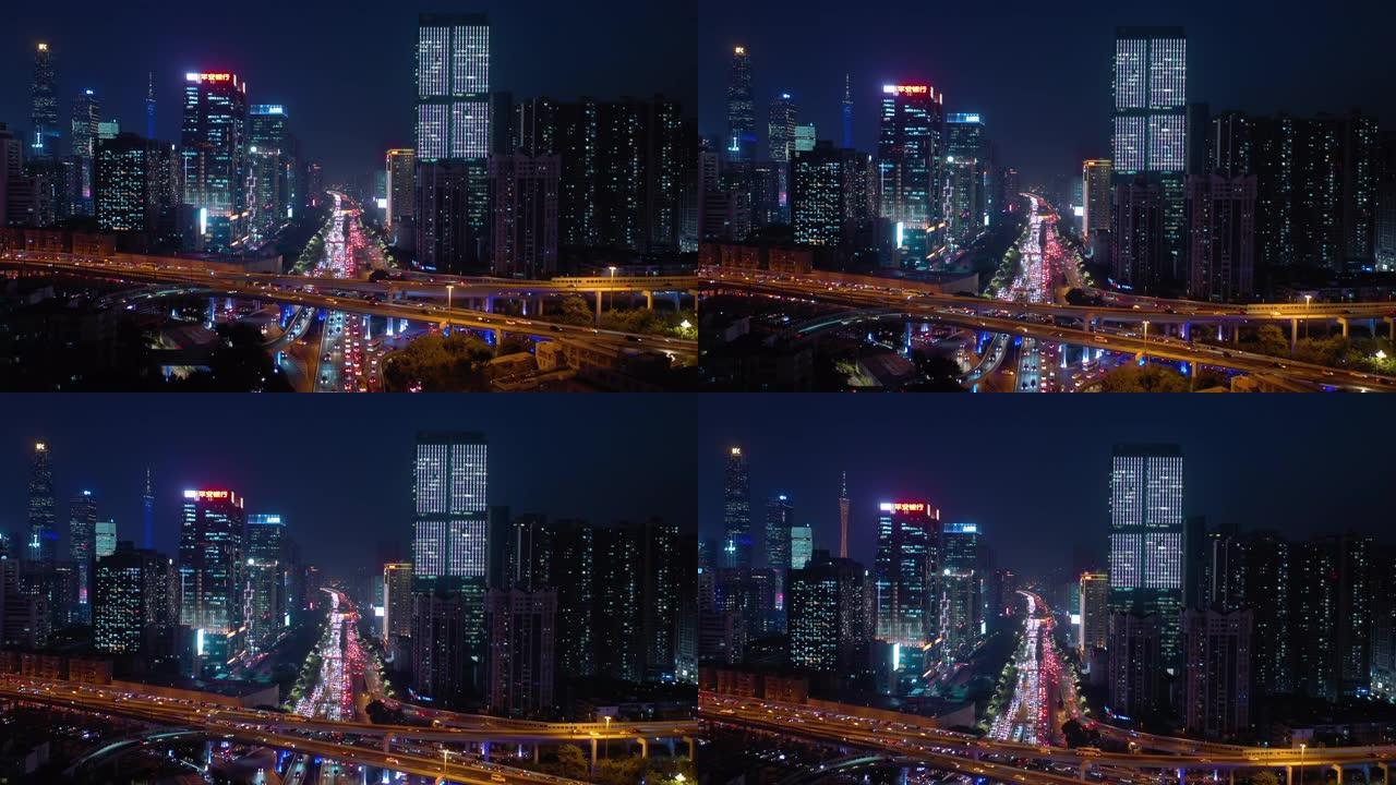 广州市中心夜间照明繁忙交通街路口空中全景4k中国