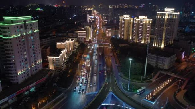 青岛市夜景照明繁忙交通街道航空全景4k中国