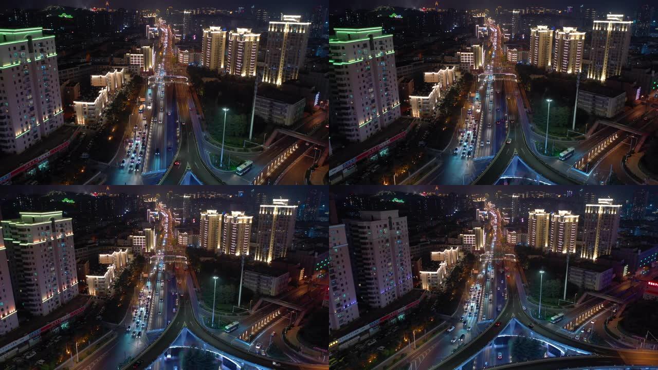 青岛市夜景照明繁忙交通街道航空全景4k中国