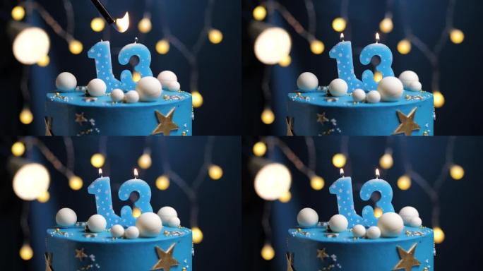 13号生日蛋糕星星天空和月亮概念，蓝色蜡烛被打火机点燃，然后吹灭。如果需要，请在屏幕右侧复制空间。特