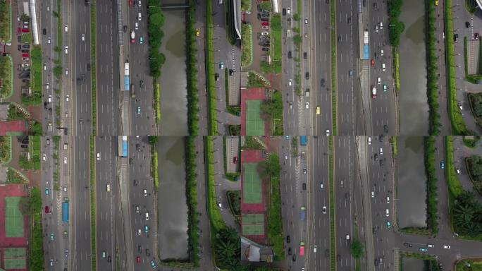 阳光灿烂的一天雅加达市区繁忙的交通道路空中全景4k印度尼西亚