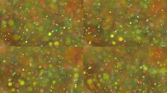 粒子在空间中的抽象混沌运动。慢动作明亮的颜色气泡油画宇宙移动多色特写。丙烯酸涂料。神奇的催眠表面。大