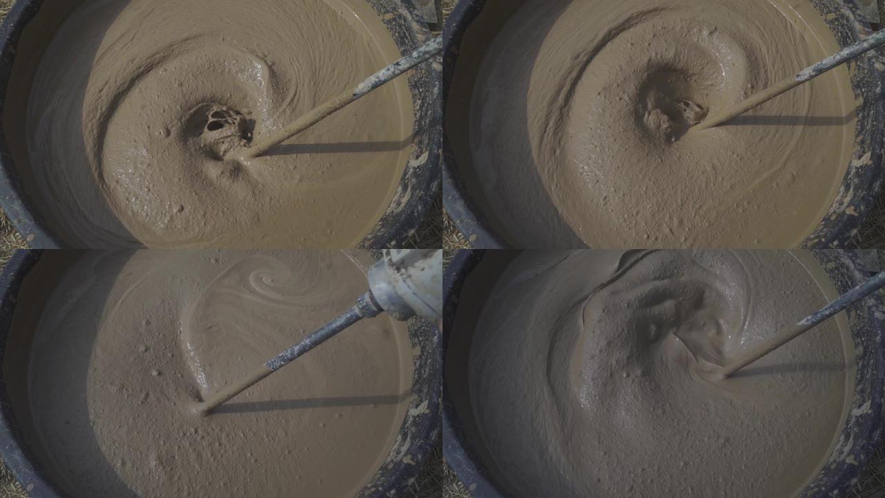 这是混合灰泥的过程。
